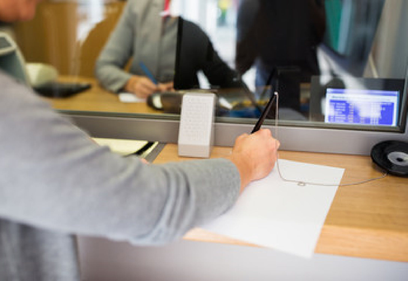 Person signing papers