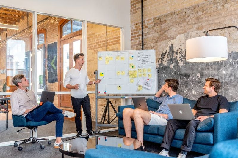 A man leading a UX meeting.